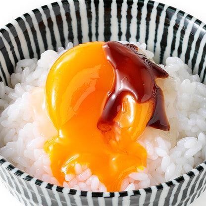 Fake Food / Rice Topped With A Raw Egg
