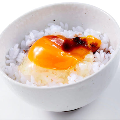 Fake Food / Rice Topped With A Raw Egg